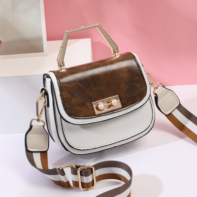 

Summer womens new Korean version of the fashion trendy small round bag impact color oblique satchel