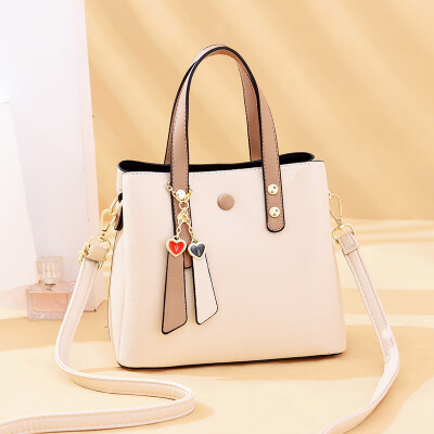 

Handbag lady simple large capacity collision color single shoulder huddle inclined pack foreign temperament Korean version tide