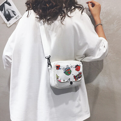 

Canvas small bag female 2019 new ins Japanese Harajuku student shoulder Messenger bag cartoon Sesame Street bag tide