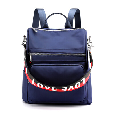 

The Korean version of the double shoulder bag is popular with students wrapped in nylon Oxford cloth small backpack canvas nylon