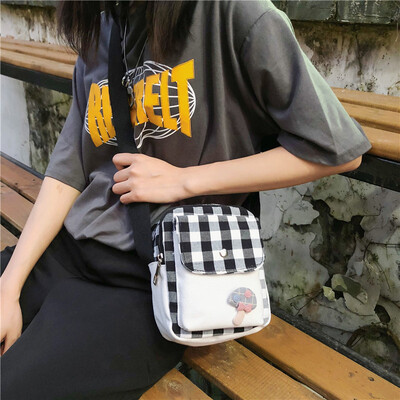 

Canvas Baggage Girls One Shoulder Slant Baggage College Student Uzzang Korean Version Ancient Sense Girls Ins Lattice