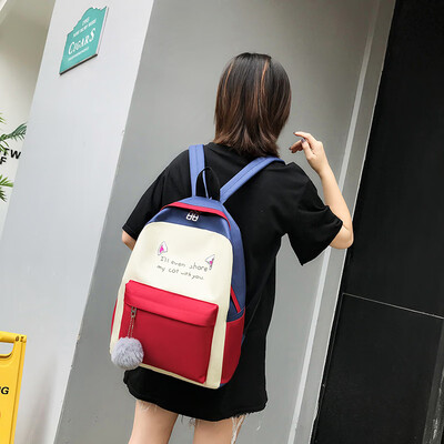 

Backpack female Korean version of Harajuku ins wind canvas four-piece travel backpack campus junior high school student bag