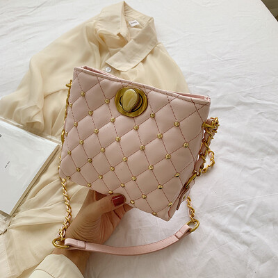 

Ins summer popular chain bag womens new 2019 Korean version of rivets fashion single shoulder oblique bag bucket bag