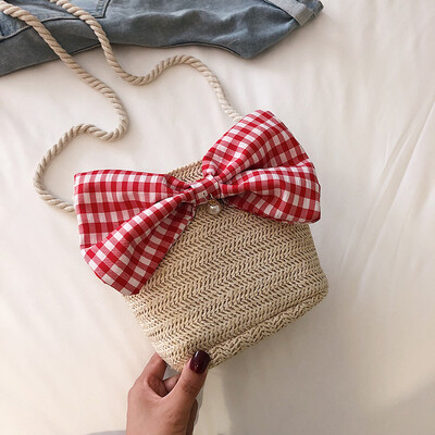 

2019 new casual simple woven bucket bag female fashion wild cute bow temperament shoulder Messenger bag