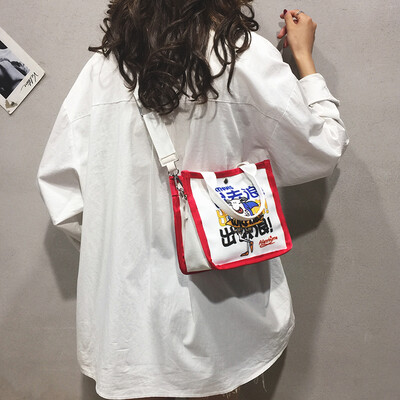 

Ins super fire handbag female 2019 new cartoon printing Messenger bag summer net red canvas shoulder bag tide