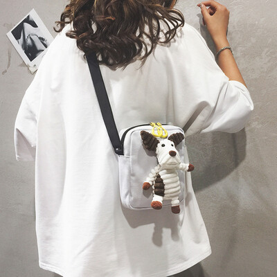 

Childrens small bag female 2019 new cartoon cute doll Messenger bag Korean version of the wild canvas shoulder mini bag