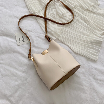 

2019 new Korean version of the small fresh casual wild shoulder Messenger bag female Sen simple temperament solid color bucket bag