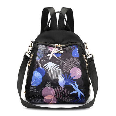 

Double shoulder bag female Oxford leisure fashion printing travel canvas small backpack Korean version 100