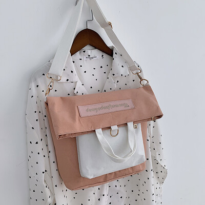 

New casual bag female 2019 new Korean version of the fashion contrast color canvas shoulders versatile shoulder slung tote bag