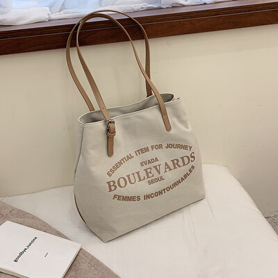 

Large-capacity canvas bag female new Korean version of fashion wild single shoulder diagonal cross-hatch color bucket ba