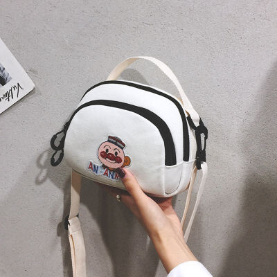 

South Korea ins childrens cartoon cute student embroidered canvas slung small bag girl soft sister Joker shoulder bag