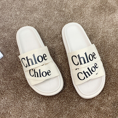 

Summer 2019 new letter slippers women wear ins net red sandals women tide beach sponge cake thick bottom drag