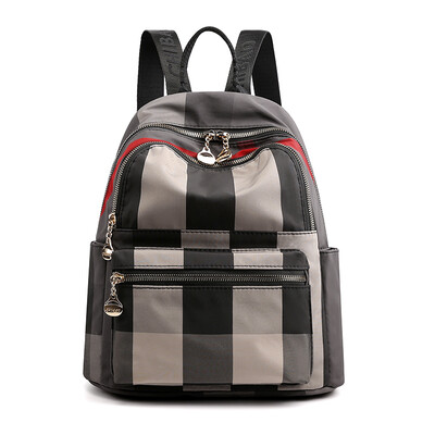 

Double shoulder bag female Korean version tide Oxford small backpack lady travel all kinds of fashion canvas schoolbag