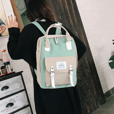 

Large-capacity school bag female 2019 new Korean version of the fashion contrast color casual canvas bag wild campus backpack