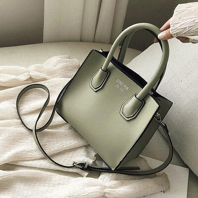 

Ins bag hit small fresh handheld girl bag in summer new 2019 fashion Tate bag oblique satchel bag