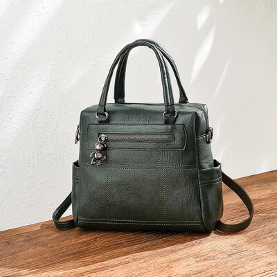 

In summer the new shoulder bag the Korean version of the handbag the fashion girl bag the backpack with one shoulder one shou