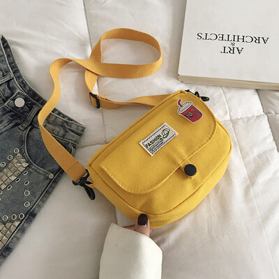 

Fashion letter temperament shoulder bag female 2019 summer new cartoon cute saddle bag casual wild canvas bag