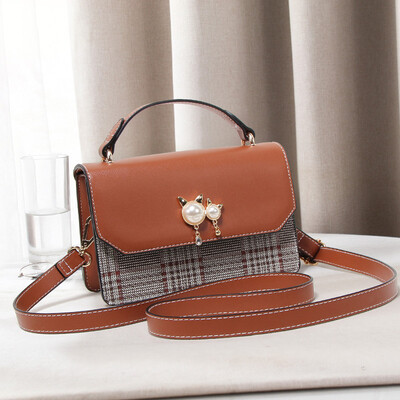 

Summer ins super hot handheld girl on the Korean version of the hundred lap shoulder slant bag fashion