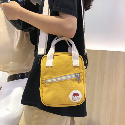 

On the new small bag canvas bag woman single shoulder bag oblique satchel college students hit the color of the ancient girl ins s