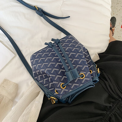 

Qiao Bani 2019 new Korean chic fashion dog teeth bucket bag collision color single shoulder diagonal trend handbags