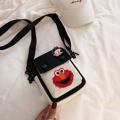 

Simple&versatile fashion contrast color shoulder Messenger bag female 2019 new casual cute cartoon sesame street canvas bag