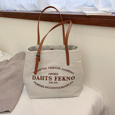 

Canvas big bag female new Korean fashion wild single shoulder Messenger bag collision color portable bucket bag