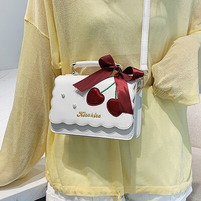 

Wild Ocean handbags handbags 2019 new fashion shoulder bag summer small fresh cherry girl Messenger bag