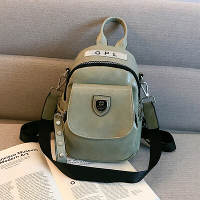 

Double shoulder bag female bag new Korean version fashion rivet schoolbag leisure soft skin lady small backpack single shoulde