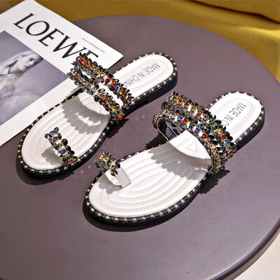 

At 2019 she was wearing summer bohemian sandals with water drilled herringbone slippers