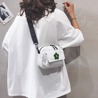 

Canvas bag female 2019 new small fresh flower girl Messenger bag Korean version of the wild Harajuku student shoulder bag
