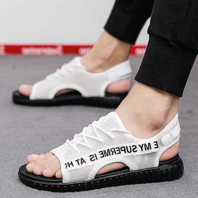 

Summer sandals Korean version of the trend of mens personality wearing a word sandals beach shoes hole shoes tide shoes