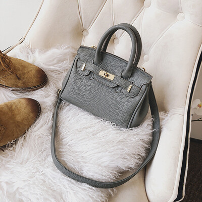 

Qiao Bani 2018 new European&American style fashion trend lychee platinum bag hand strap shoulder diagonal female bag