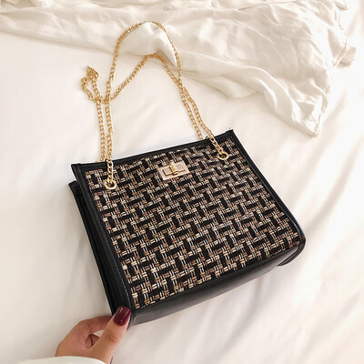 

2019 new simple contrast color woven bag fashion casual wild shoulder bag female Sen temperament chain Messenger bag