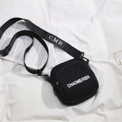 

Ins bag female 2019 new wave casual letter shoulder small round bag Korean version of the simple solid color canvas Messenger bag