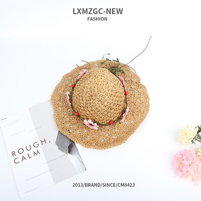 

Parent-child hand-woven hollow straw hat Lady outdoor sunscreen sunhat Childrens flower strap hat