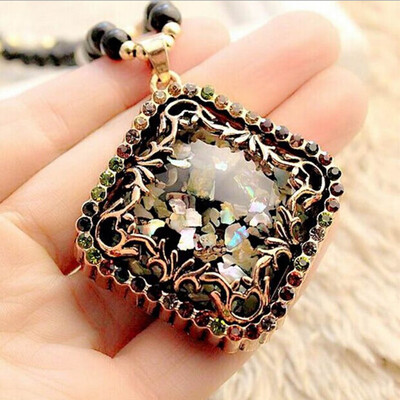 

Lady High-end Color Restoring Ancient Ways Cat Eye Long Sweater Chain Adornment Necklace