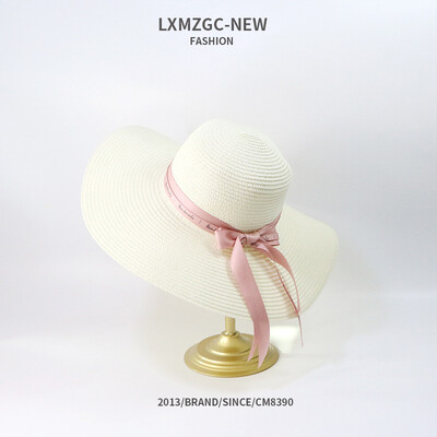 

New Korean version of hat lady outdoor sunscreen sun hat butterfly knot double letter drifting with large eaves straw hat