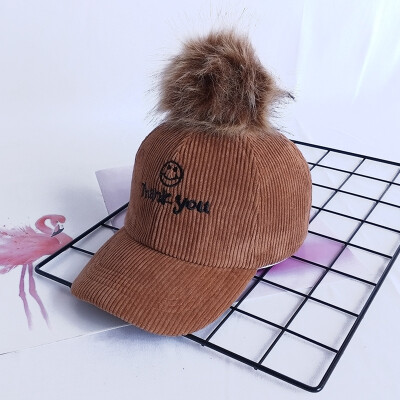 

Childrens hat autumn&winter boys baseball cap wick velvet girls cap big hair ball baby hat Korean version tide