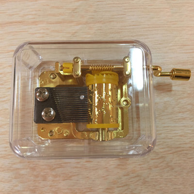 

Exquisite Clear Acrylic Square Gold Hand Cranked Gurdy 18 Note Music Box Play Castle in the Sky