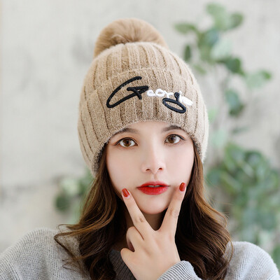 

2019 New Korean ladies fur ball letter Joker solid color wool hat warm winter pullover knitted hat tide