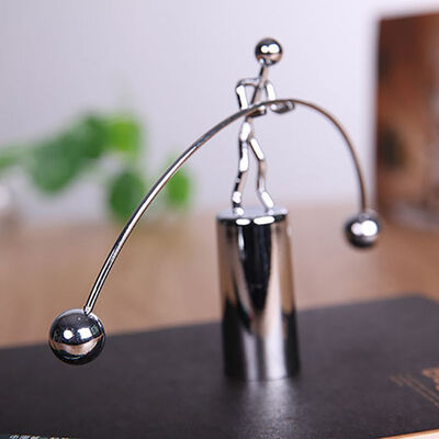 

Funny Balance Perpetual Motion Weightlifting Iron Man Toy Pendulum Newton Home Office Table Decoration