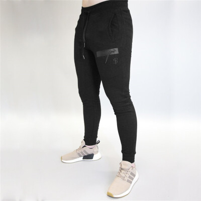 

Muscle Dr brothers mens casual sports pants beam mouth fitness outdoor new hot feet Slim trousers