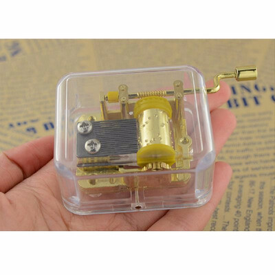 

Unique Musical Box Acrylic Hand Crank Music Box Golden Movement Melody