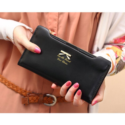 

Korean Version of sweet and cute bow Multi- Card Handbag Ms. Long Wallet