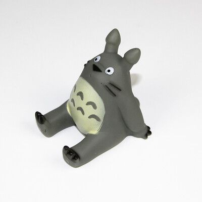 

Side of the desktop mobile phone holder mobile phone base car tilting tigers