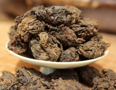 

Aged Wild Liu Bao Lao Cha Tou Golden Bud Nuggets Dark Tea China Guangxi Hei Cha