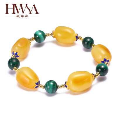 

Ai Hua Shang (HWSA) with amber amble wax with malachite hand with a certificate