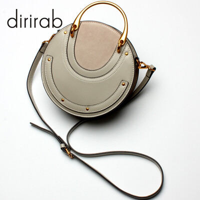 

Dirirab genuine leather womens shoulder bag round bag handbag small round bag cowhide diagonal package pig bag rivets fashion