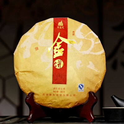 

Xin Yi Hao Supreme Golden Needle Dian Hong Tribute Cake Yunnan Black Tea 357g