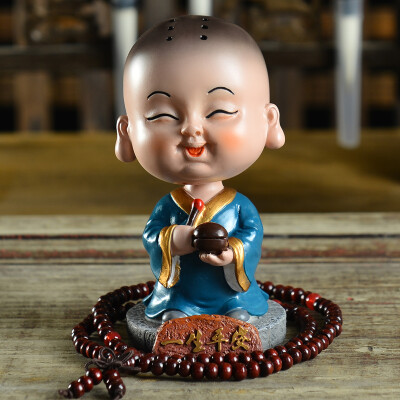 

Kang car treasure car ornaments shaking head Maitreya Buddha cartoon little monk pendant decoration car interior decoration for a lifetime